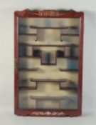 A CHINESE MOTHER OF PEARL INLAID HARDWOOD SNUFF BOTTLE DISPLAY CABINET, 80cm x 51cm.