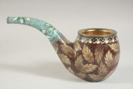 AN UNUSUAL JAPANESE CLOISONNE PIPE, with foliate decoration, 21cm long.