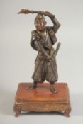 A FINE JAPANESE BRONZE OKIMONO of a warrior, signed Miyao Zo, mounted to a wooden base, 19.5cm