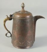 A PERSIAN SAFAVID INSCRIBED COPPER SPOUTED TANKARD, with engraved decoration, 28cm high.
