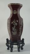 A LARGE CHINESE SHELL INLAID LACQUERED HEXAGONAL VASE, with decorative panels of flora and fauna,