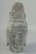 A CARVED STONE BUDDHA HEAD, 32cm x 14cm.