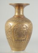 A PERSIAN QAJAR ENGRAVED AND CHASED BRASS VASE, with decorative panels of animals and flora, 26cm
