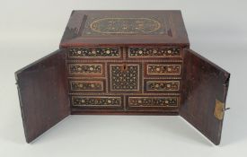 A VERY FINE LARGE EARLY 17TH CENTURY INDIAN INDO PORTUGUESE IVORY INLAID WOODEN TABLE CABINET, the