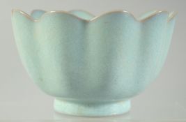 A CHINESE CELADON GLAZE PETAL-FORM BOWL, 16.5cm diameter.