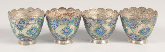 A FINE SET OF FOUR 18TH-19TH CENTURY INDIAN LUCKNOW ENAMELLED SILVER CUPS, 5.5cm diameter, (4).