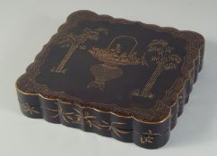 A FINE BLACK AND GILT LACQUER LIDDED BOX, containing five fitted smaller lidded boxes, each