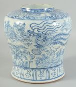 A 20TH CENTURY CHINESE BLUE AND WHITE PORCELAIN LANDSCAPE JAR, with kylin and phoenix, 22cm high.