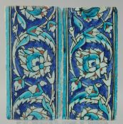 A FINE PAIR OF EARLY 17TH CENTURY OTTOMAN TURKISH IZNIK BORDER TILES, with foliate decoration,