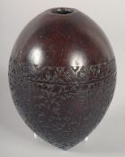 A FINE 19TH CENTURY PERSIAN QAJAR ENGRAVED COCONUT HUQQA BASE, 13cm long.