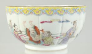 A CHINESE FAMILLE ROSE PORCELAIN BOWL, painted with a scene of various figures, six-character mark