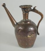 A PERSIAN ENGRAVED TINNED COPPER EWER, the engraved panels depicting figures, animals and flora,