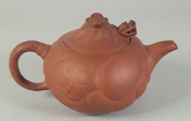 A CHINESE YIXING TEAPOT, the lid with articulated dragon head, 20cm spout to handle.