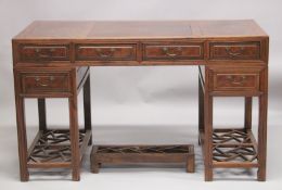 A 19TH CENTURY CHINESE HARDWOOD DESK, with burlwood top and five drawers.