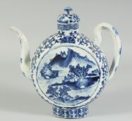 A FINE 19TH CENTURY CHINESE BLUE AND WHITE PORCELAIN MOON-SHAPE TEAPOT, painted with a mountainous