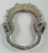 A RARE LARGE 12TH CENTURY CAMBODIAN KHMER BRONZE SADDLE RING, 20cm x 18cm.