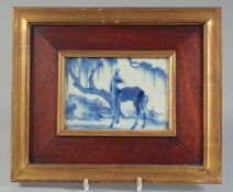 A FINE 19TH CENTURY CHINESE FRAMED BLUE AND WHITE PORCELAIN PANEL, painted with a horse in a