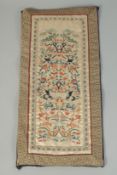 A CHINESE EMBROIDERED SILK PANEL.