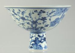A CHINESE BLUE AND WHITE PORCELAIN STEM CUP, the interior with a band of characters and six-