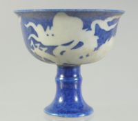 A SMALL CHINESE BLUE GROUND DRAGON STEM CUP, 8.5cm diameter.