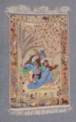 AN AFGHAN PICTORIAL SILK RUG, with seated male and female beneath trees and a border of flora and