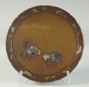 A JAPANESE MEIJI PERIOD BRONZE CHARGER; FROM THE WORKSHOP OF NOGAWA, decorated with two mixed