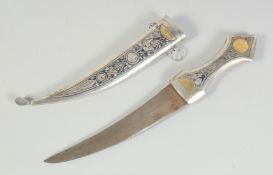 A FINE LARGE IRAQI NIELLO AND GOLD INLAID SILVER DAGGER, 35.5cm long.
