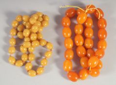 TWO BAKELITE / AMBER STYLE BEADED NECKLACES.