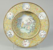 A FINE RARE QING DYNASTY YELLOW GROUND CLOISONNE ENAMEL CHARGER, decorated with a central panel