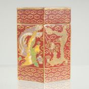 A SMALL CLOISONNE HEXAGONAL LIDDED BOX, with dragons and phoenix, gilt character mark to base, 5.5cm