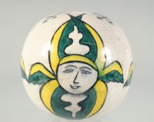 A TURKISH KUTAYHA GLAZED POTTERY HANGING BALL ORNAMENT, 11cm.