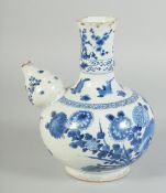 A CHINESE BLUE AND WHITE PORCELAIN EWER KENDI, painted with birds and native flora, 20.5cm high.
