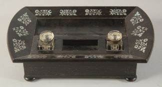 AN ISLAMIC TURKISH MOTHER OF PEARL INLAID CALLIGRAPHER'S PEN STAND, 36cm x 23cm.