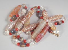 A GOOD CARVED CRYSTAL NECKLACE.