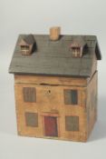 A REPLICA WOODEN HOUSE BOX.