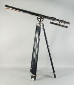 A LARGE TELESCOPE on a stand.