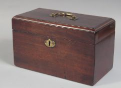 A GEORGE III MAHOGANY THREE DIVISION TEA CADDY 9ins long.