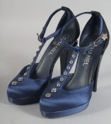 A PAIR OF CHANEL BLUE SATIN SHOES with diamantes. Size 37.
