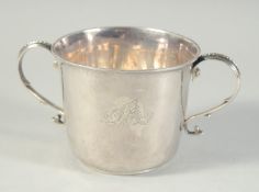 A GOOD GEORGE I SILVER TWO HANDLED CAUDLE CUP by JAMES MARGAS. London 1718. Weight: 8ozs