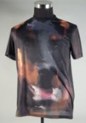 A GIVENCHY OF PARIS TEE SHIRT with splash decoration. Size, medium.