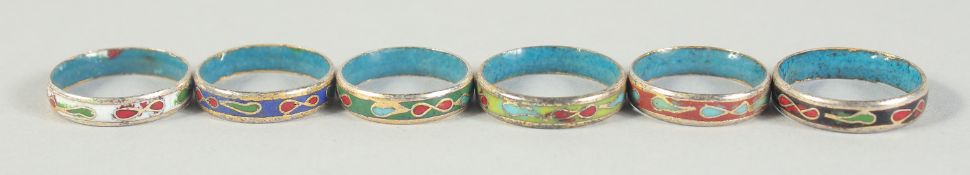 FIVE CLOISONNE RINGS.