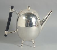 A LARGE CHRISTOPHER DRESSER STYLE, SILVER PLATED EGG SHAPED TEA POT. 4ins diameter.