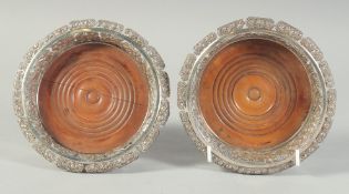 A GOOD PAIR OF EUROPEAN 19TH CENTURY WHITE METAL CIRCULAR WINE COASTERS with foliate edges and