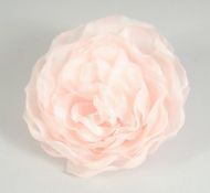 A CHANEL SILK PINK FLOWER BROOCH. Signed.