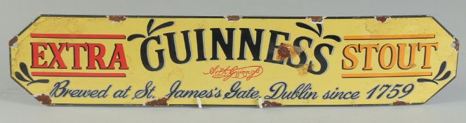 AN ENAMEL GUINNESS SIGN. 5ins x 22ins.