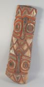 AN 18TH CENTURY CARVED ANCESTORS PANEL from Papua New Guinea. 36ins long.