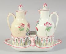 A 19TH CENTURY LUNEVILLE OIL AND VINEGAR DECANTER SET. 9ins long.