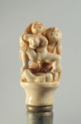 A CARVED BONE HANDLED WALKING STICK 