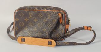 A LOUIS VUITTON SHOULDER BAG. 9ins long, 5.5ins long.