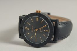A GOOD BULGARI BLACK MADRID WRISTWATCH AND STRAP. 103/400 in original box.